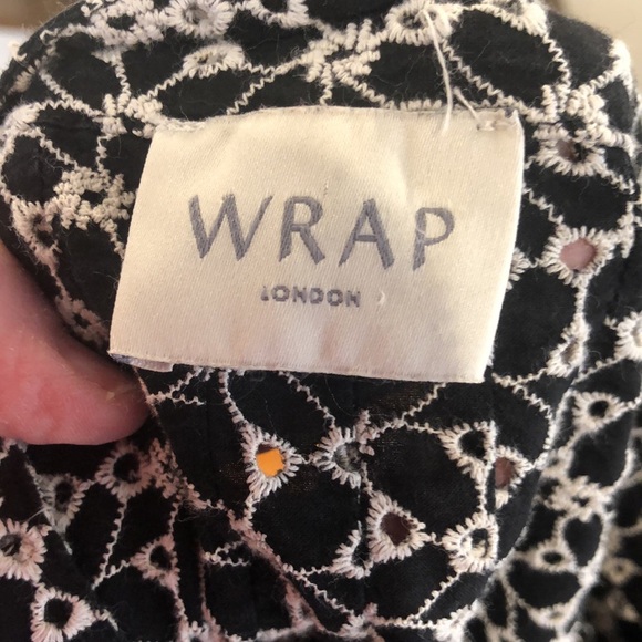 WRAP London black & white button close dress with open front pockets.  Size 18. - Picture 8 of 11